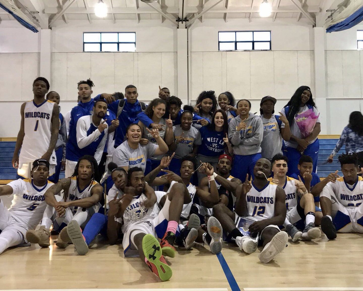 The West Los Angeles College Men's and Women's Basketball team celebrate their 2018 WSC South titles. For the men, it was their first since 2006, and the women their first since 1999.